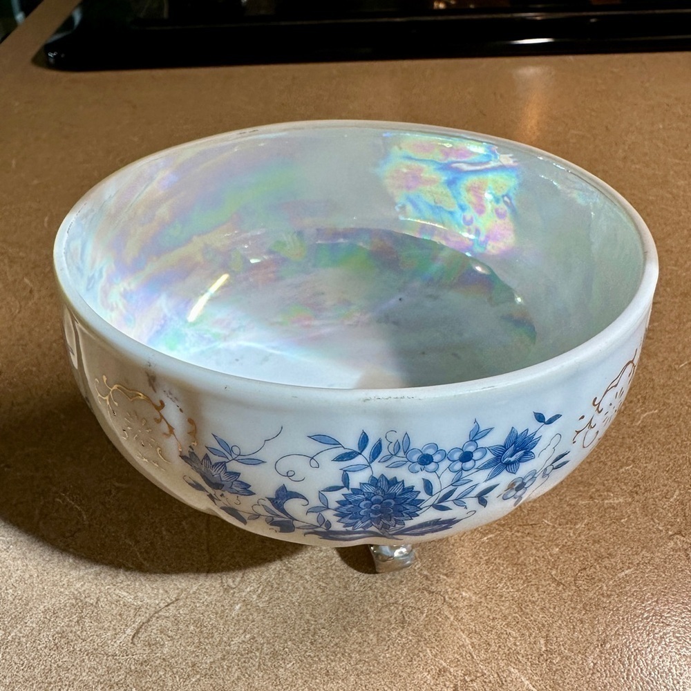 WHITE MOTHER OF PEARL,SMALL PORCELAIN BOWL WITH BLUE FLORAL DESIGN.3 GILTED LEGS